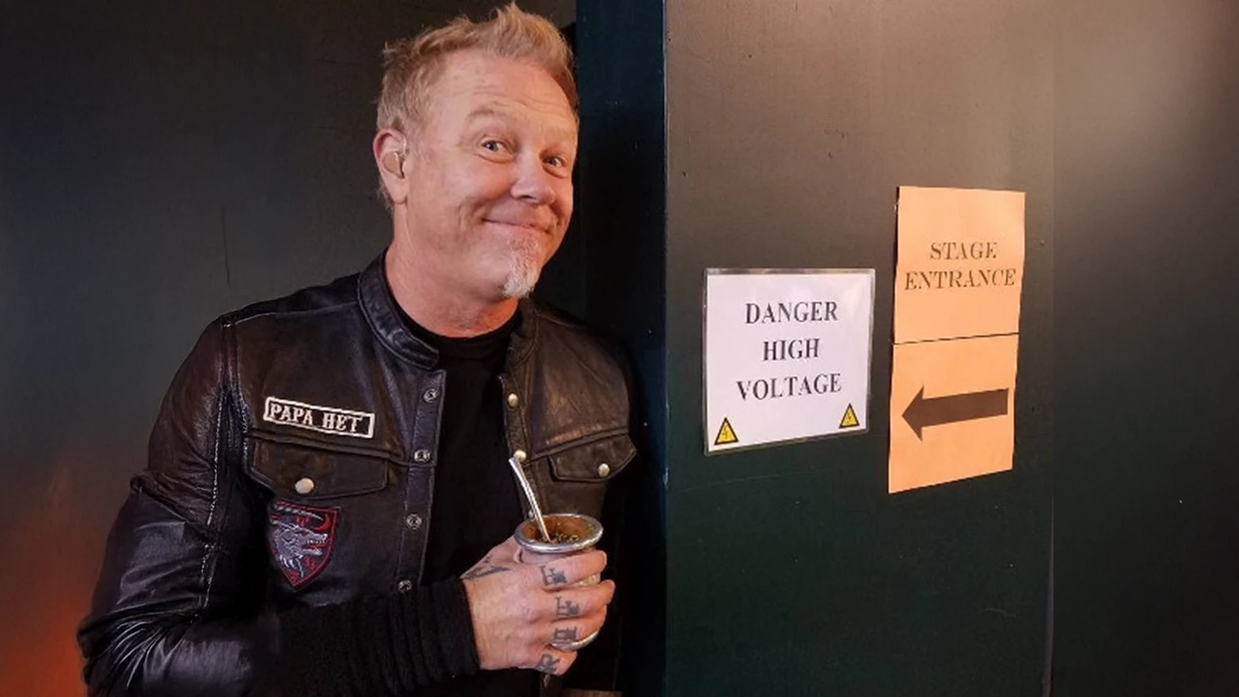 James Heffield from Metallica holds a cup of yerba mate with bombilla signifying what is yerba mate.
